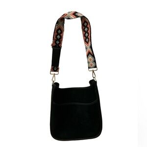 Ahdorned velvet material bag.